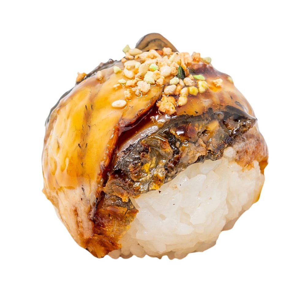A Bloop Bloop sushi roll with glazed eel, rice, and a topping of crushed nuts.